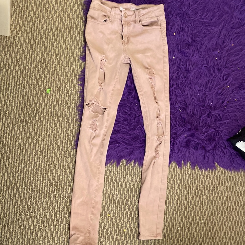 Rusty pink ripped jeans